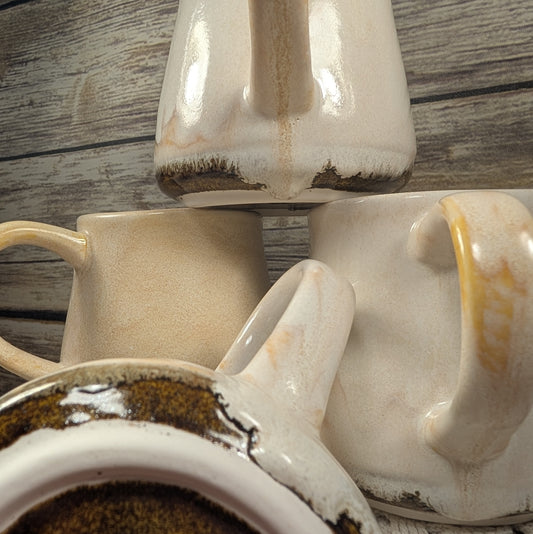 Close-up of a ceramic cups on a wooden surface