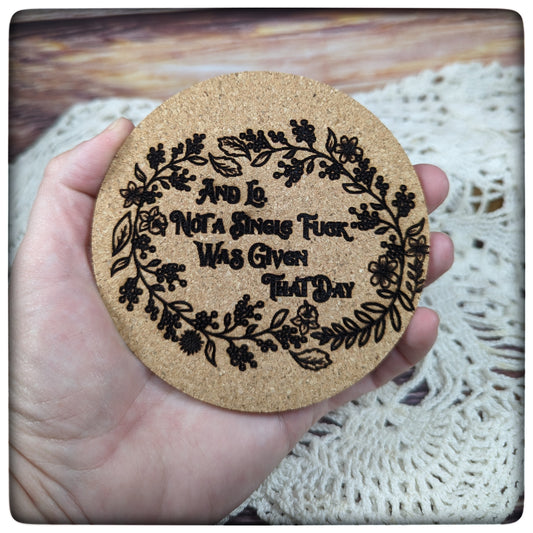 "And Lo" cork coaster