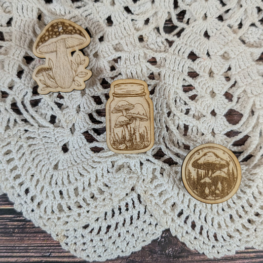 Wooden mushroom magnets on a lace doily