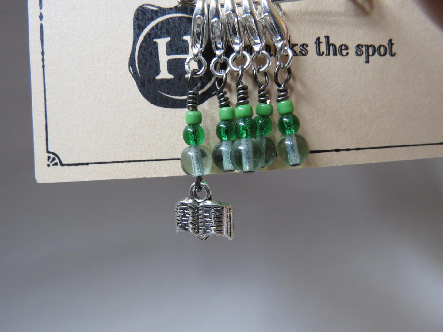 Book stitch marker set in green