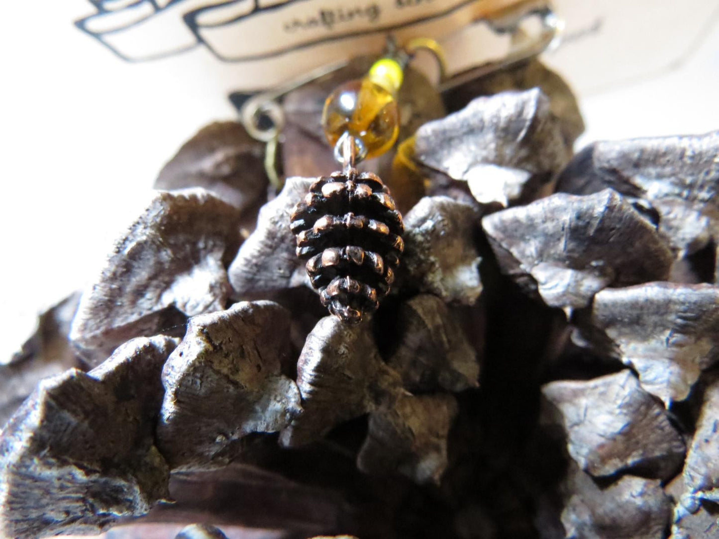 Pine cone stitch marker set in yellow