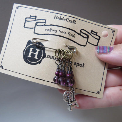 Spinning Wheel stitch marker set in purple
