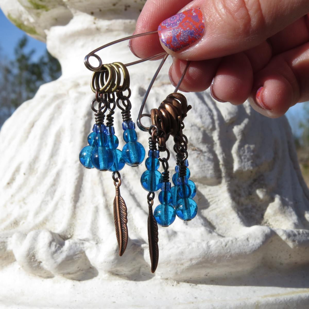 Feather stitch marker set in blue