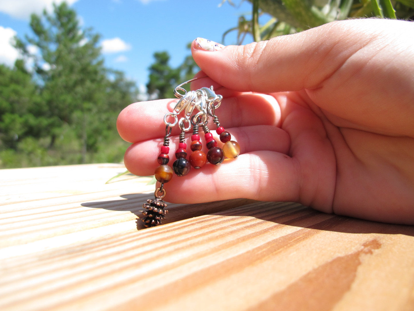 Pine cone stitch marker set in red