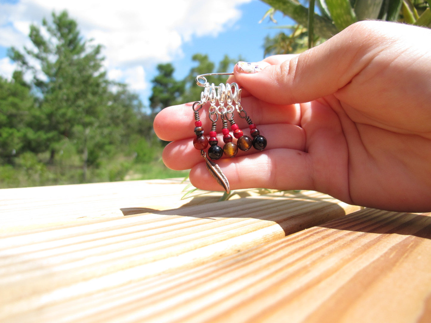 Feather stitch marker set in red