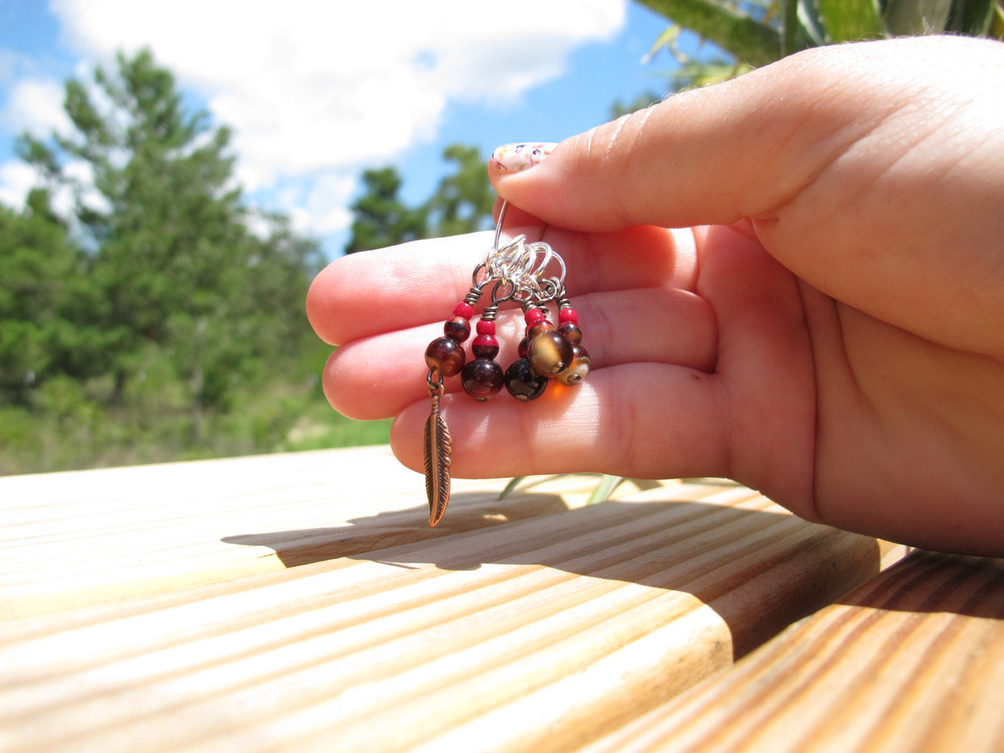 Feather stitch marker set in red