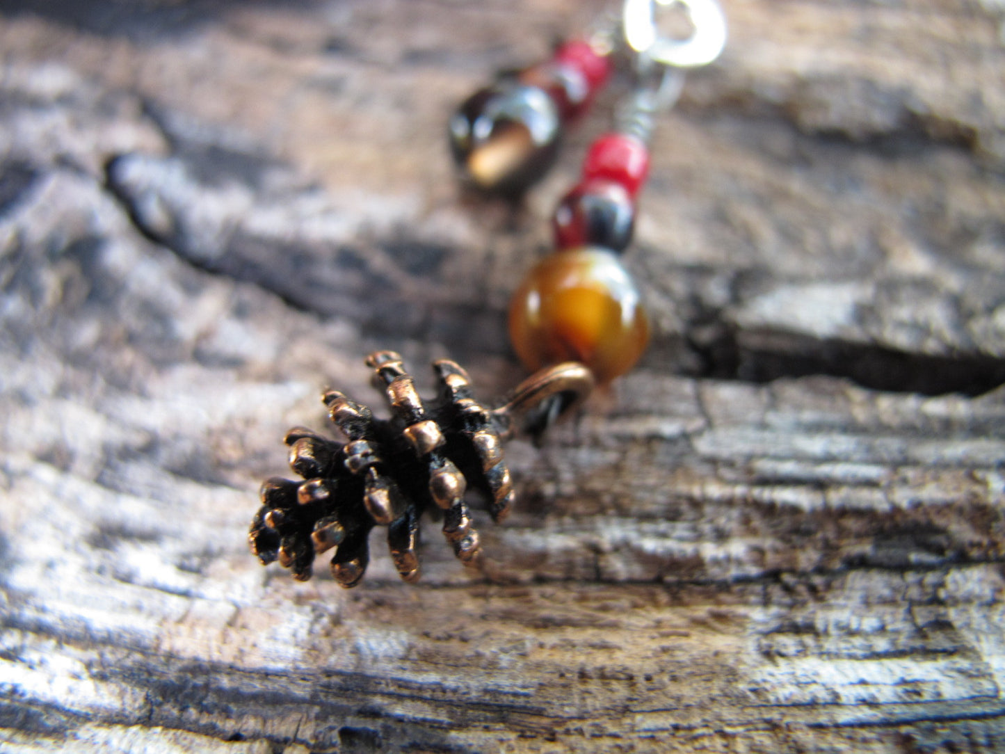 Pine cone stitch marker set in red